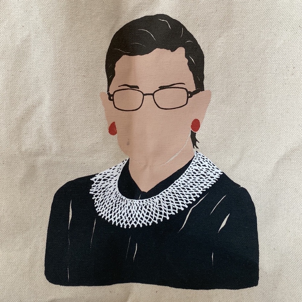 The Strand Icon RBG Time is one the side of CHANGE Tote Bag - Picture 9 of 10